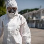 man in biohazard suit