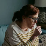 Woman coughing