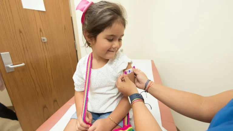 Girl receiving vaccination